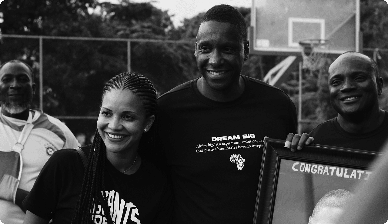 Four smiling community members